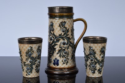 Lot 93 - A Victorian period Royal Doulton stoneware lemonade set by George Tinworth