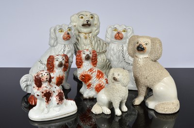 Lot 102 - Eight Victorian Staffordshire pottery dogs