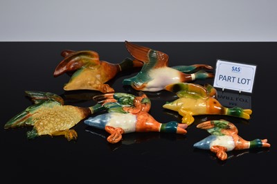 Lot 132 - A group of twelve wall hung flying ducks