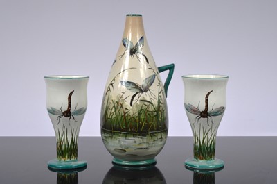 Lot 144 - A Wemyss Ware pottery ewer and pair of goblets