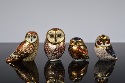 Lot 147 - Three Royal Crown Derby porcelain owl paperweights