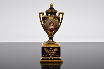 Lot 159 - A late 19th century French porcelain covered twin handled vase