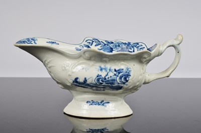 Lot 168 - An 18th century English blue and white porcelain sauce boat