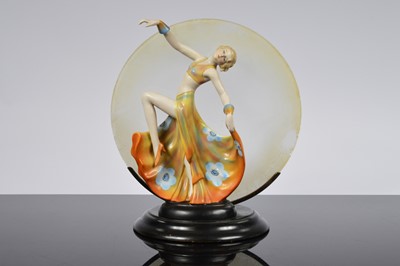 Lot 189 - A ceramic art deco style dancing female mounted lamp