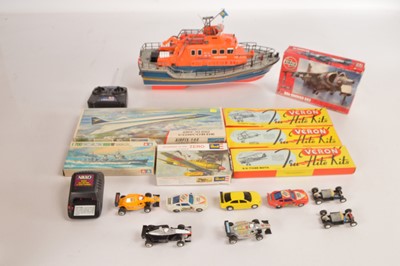 Lot 360 - Airfix and Revell plastic aircraft kits and Tamiya Waterline kit with Veron Tru-Flite balsa wood Aircraft kits RNLI  RC Controlled boat and various Chines made Slot Cars (18)