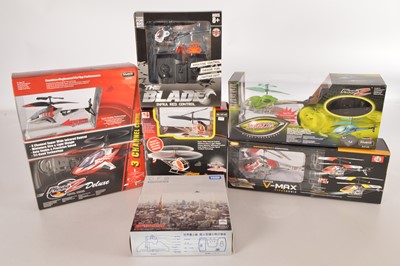Lot 411 - Five modern Infra red Radio Control Helicopters and one Flying Saucer unused in original boxes (6)