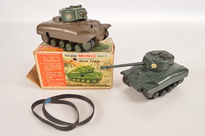 Lot 458 - Pair of Tri-ang Minic Series II Large Scale clockwork Sherman Tank one on original box (2)