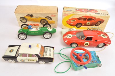 Lot 465 - Paya boxed plastic large scale battery operation  Lotus and Ferrari Racing Cars and unboxed JYE tinplate Seat Spanish Police Car (3)