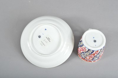 Lot 37 - A late 18th century Worcester 'Queen Charlotte' pattern tea cup and saucer