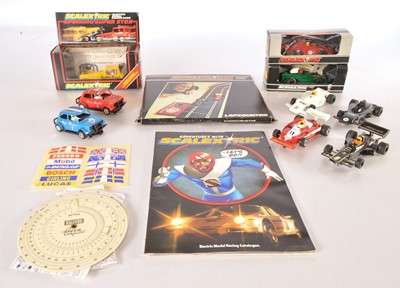 Lot 475 - Scalextric boxed and unboxed Slot Cars (9 cars and lap counter and ephemera)