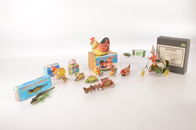 Lot 489 - Collection of old and modern boxed and unboxed Tinplate Toys mainly featuring animals by various makers (12)