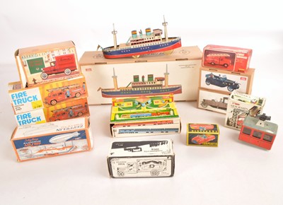 Lot 490 - Collection of Modern mostly European clockwork Tinplate Transport Toys by various makers (12)