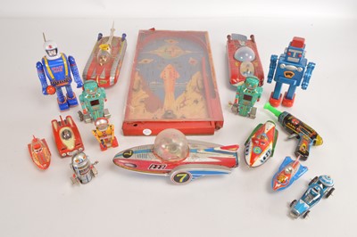 Lot 512 - Battery and clockwork and friction tinplate mostly Space and Sci-Fi Toys including large and small Space Ships Robots and Gun and vintage wooden Space Bagatelle (15)