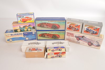Lot 514 - Schylling and other manufacturers boxed tinplate clockwork Racing Cars (12)