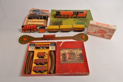 Lot 520 - Three Mettoy boxed Tinplate and plastic clockwork Train Starter Sets and Brimtoy clockwork Train and Mettoy Floor Train (9)