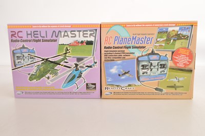 Lot 523 - Pair of boxed Reality Craft Aircraft Radio Control Controllers (2)