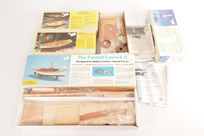 Lot 538 - Midwest Products unmade wooden Boat kits including Steam Boat with Steam Engine and two Dingys (4)