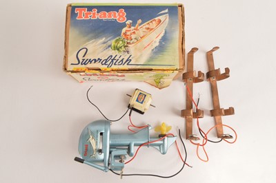 Lot 552 - Tri-ang Swordfish Outboard Motor in original box