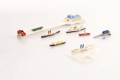 Lot 563 - Tri-ang Minic 1/1200 scale Complete Pierhead with Lifeboat Station and Paddle Steamers (qty)