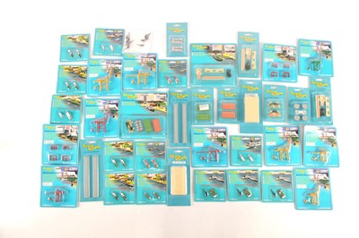 Lot 572 - New Issue Tri-ang Ships 1/1200 scale Harbour and Dock Accessories unused in original packaging (32 packs)