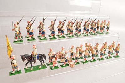 Lot 670 - Trophy Miniatures 40pce marching Highland troops (18) with band (20) and mounted officer and colours (40)