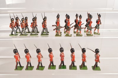 Lot 735 - John Hill rare post WW2 figures comprising Black Watch marching at slope (2) and trail (7) - 1 rifle butt missing