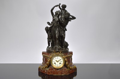 Lot 5 - A 19th century French marble and bronze clock