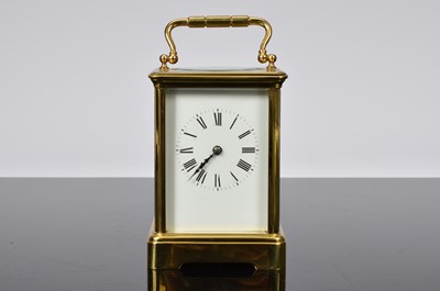 Lot 12 - A first half 20th century French brass carriage timepiece