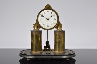 Lot 15 - An early 20th century electronic mantle clock