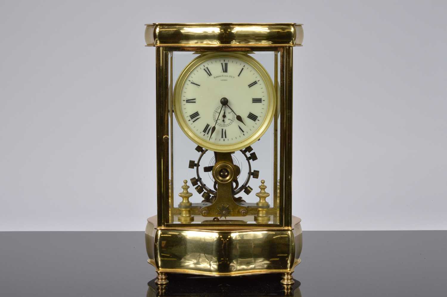 Lot 16 - An early 20th century Eureka Clock Co Ltd electronic brass and glazed mantle clock