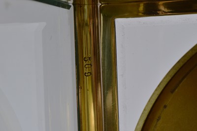 Lot 16 - An early 20th century Eureka Clock Co Ltd electronic brass and glazed mantle clock