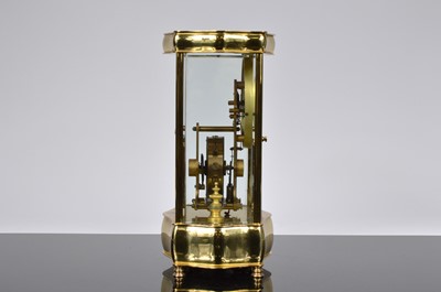 Lot 16 - An early 20th century Eureka Clock Co Ltd electronic brass and glazed mantle clock
