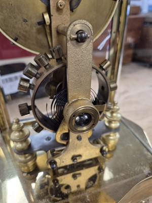Lot 16 - An early 20th century Eureka Clock Co Ltd electronic brass and glazed mantle clock