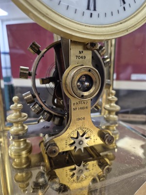 Lot 16 - An early 20th century Eureka Clock Co Ltd electronic brass and glazed mantle clock