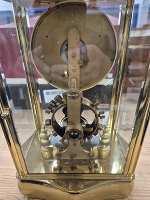 Lot 16 - An early 20th century Eureka Clock Co Ltd electronic brass and glazed mantle clock