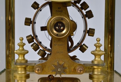 Lot 16 - An early 20th century Eureka Clock Co Ltd electronic brass and glazed mantle clock