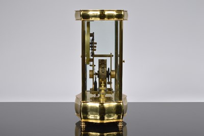 Lot 16 - An early 20th century Eureka Clock Co Ltd electronic brass and glazed mantle clock