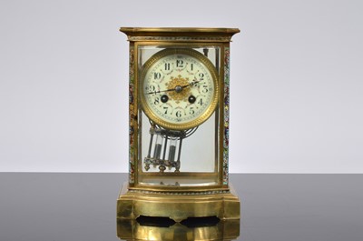 Lot 29 - A pretty French late 19th century brass and enamelled mantle clock