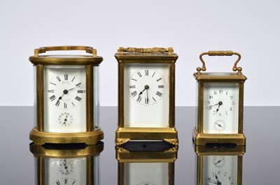 Lot 33 - Three brass carriage timepieces