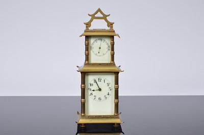 Lot 34 - A brass carriage timepiece with barometer