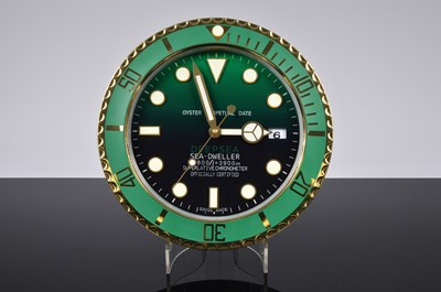 Lot 43 - A modern Dealership style wall clock