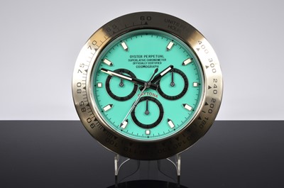 Lot 48 - A modern Dealership style wall clock