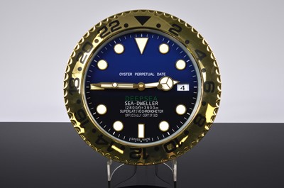 Lot 54 - A modern Dealership style wall clock