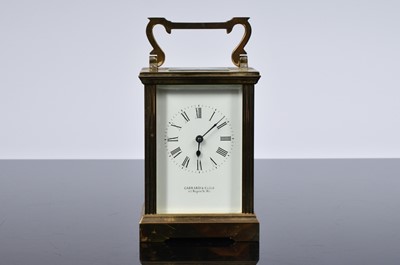 Lot 70 - A vintage brass carriage timepiece from Garrard & Co