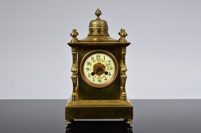 Lot 71 - An early 20th century brass and porcelain mounted mantle clock