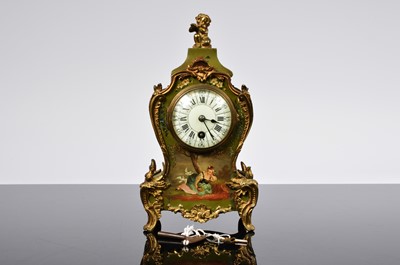 Lot 79 - A French Louis XV style painted and gilt mantle clock