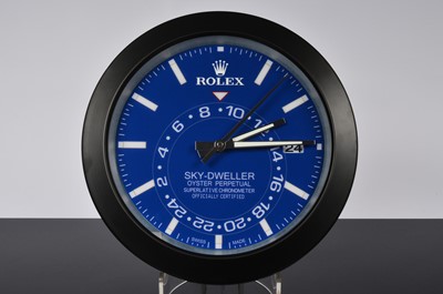 Lot 91 - A modern Watch Dealership style wall clock