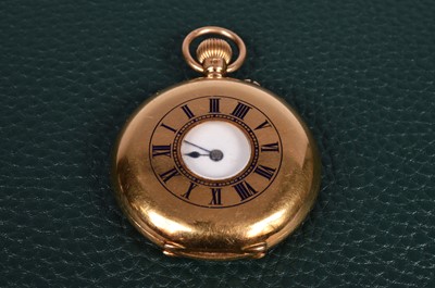 Lot 100 - An Edwardian 18ct gold half hunter lady's pocket watch from Goldsmiths & Silversmiths