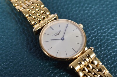 Lot 160 - A 1990s Longines quartz gold plated lady's wristwatch