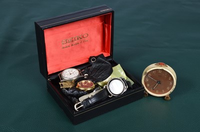 Lot 163 - A group of eight watches and an Oris alarm clock